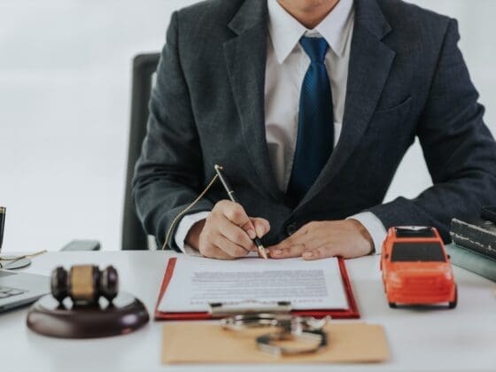 Car Accident Lawyer sitting at desk