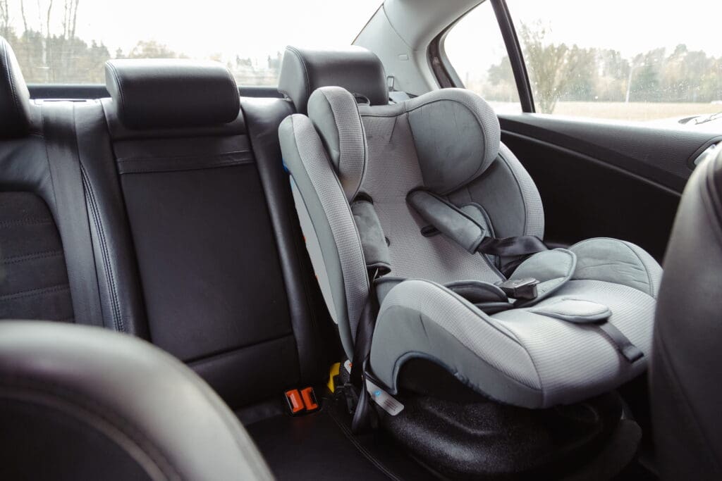 car seat in back seat of car to reprsent georgia car seat laws